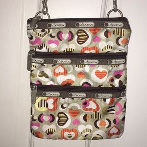 Lesportsac cross body heart-patterned bag